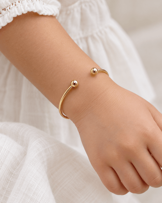 9CT Yellow Gold Open Cuff Kids Bangle with Spherical Ends - Hyman’s Jewellers