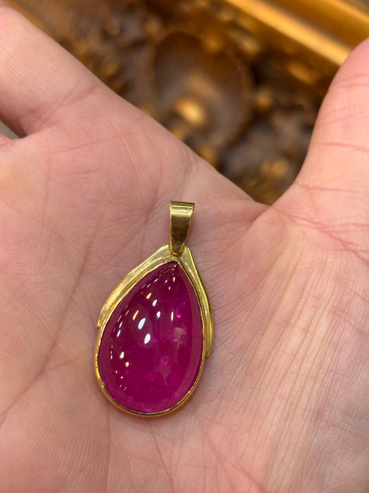 Yellow Gold Pendant with Pear - Shaped Treated Ruby Cabochon - Hyman’s Jewellers