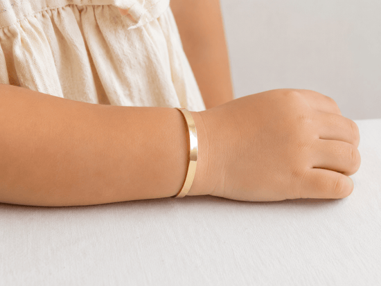 9ct children Classic Flat Profile Yellow Gold Bangle - Hyman’s Jewellers