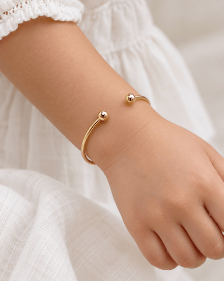 9CT Yellow Gold Open Cuff Kids Bangle with Spherical Ends - Hyman’s Jewellers