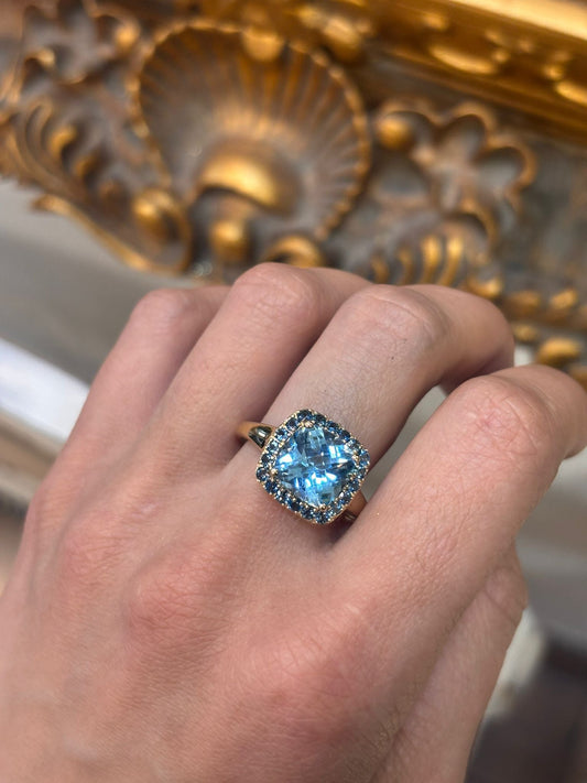 Cushion - Cut Blue Topaz Halo Cocktail Ring in 9CT Yellow Gold - Hyman’s Jewellers