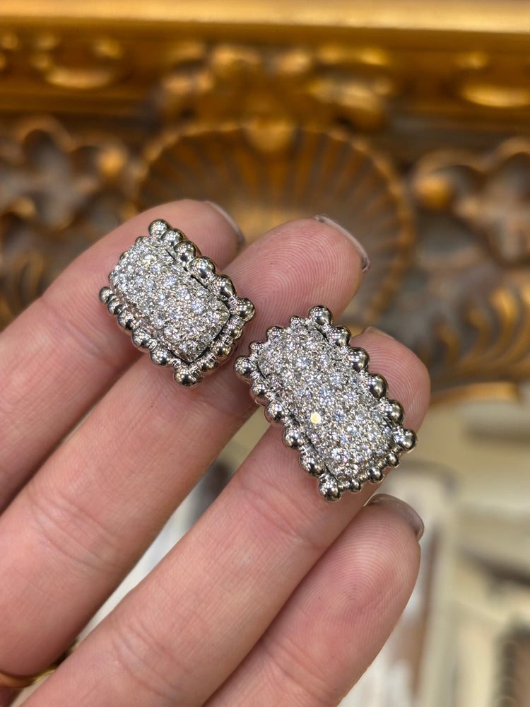 Natural Diamond studs in hand